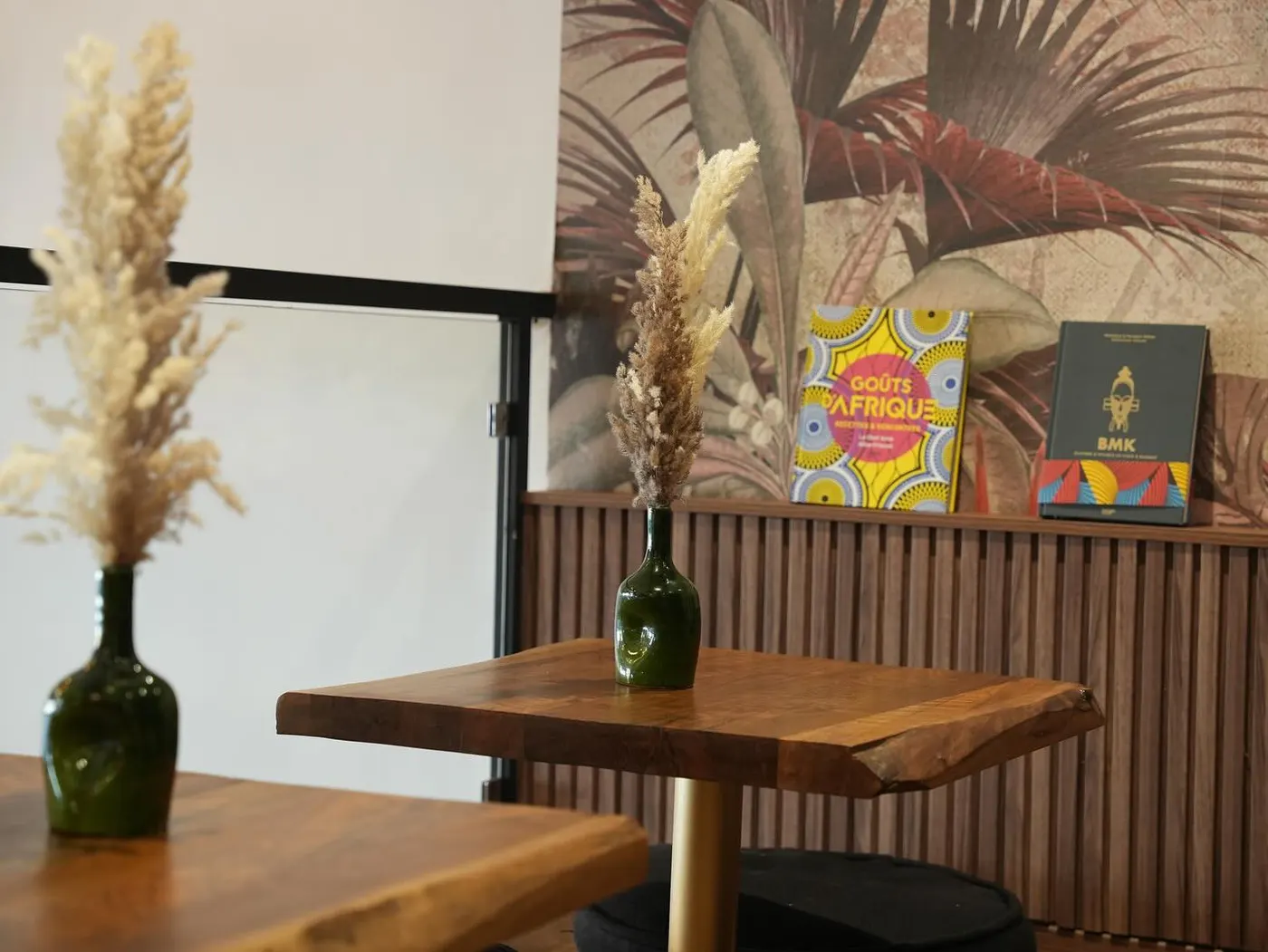 Warm wooden tables in the Le Labo Africain dining room